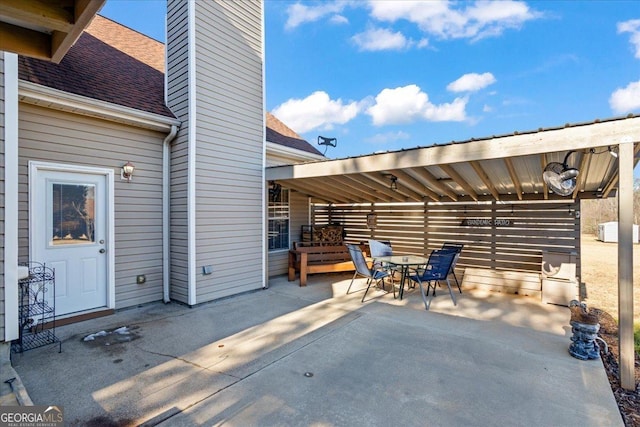 view of patio with outdoor dining area