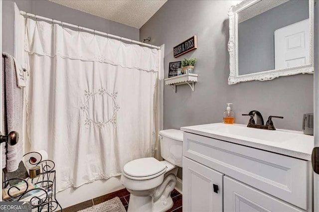 bathroom with a textured ceiling, toilet, shower / tub combo, vanity, and tile patterned floors