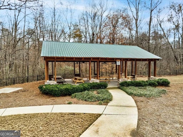 view of community featuring a gazebo and fence