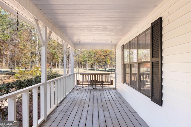 deck with covered porch