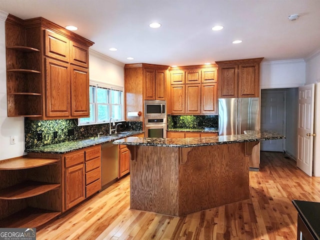 kitchen featuring open shelves, appliances with stainless steel finishes, and crown molding