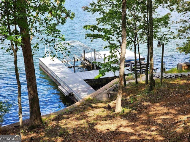 dock area featuring a water view