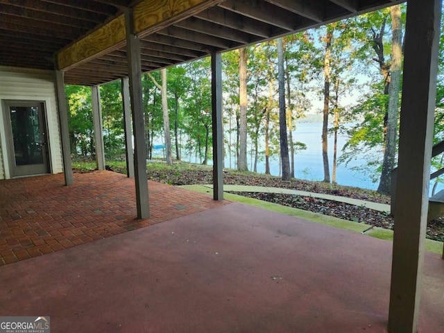 view of patio / terrace with a water view