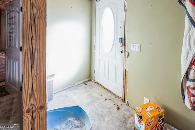 entryway featuring concrete flooring