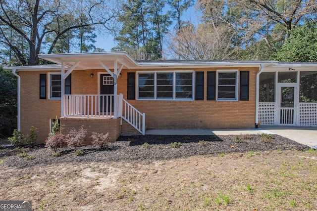 ranch-style home with brick siding