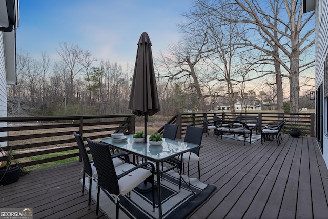 deck featuring outdoor dining space