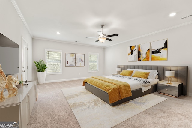 carpeted bedroom featuring ornamental molding, recessed lighting, visible vents, and baseboards