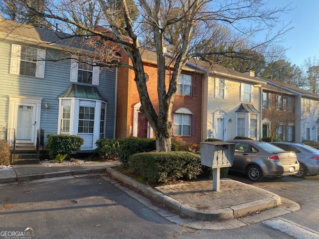 multi unit property featuring brick siding