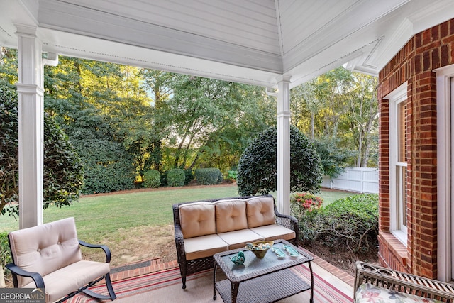 view of patio / terrace with fence and an outdoor hangout area