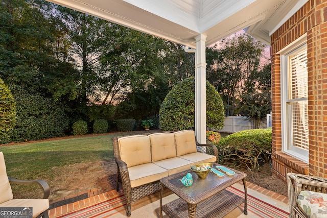 deck with fence, an outdoor living space, a patio, and a yard