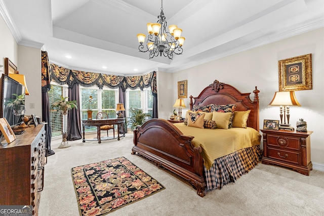 bedroom with ornamental molding, a tray ceiling, access to exterior, and carpet