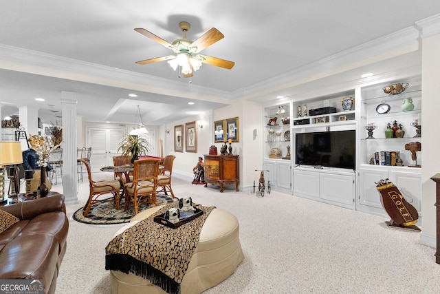 living room featuring baseboards, a ceiling fan, crown molding, built in shelves, and recessed lighting