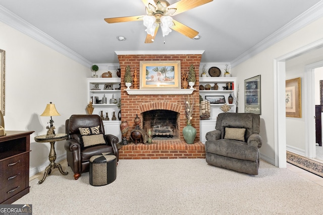 sitting room featuring baseboards, a fireplace, carpet flooring, and crown molding