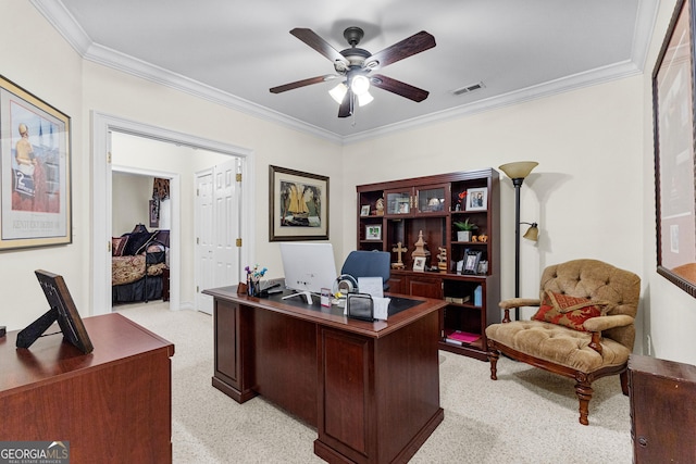 office with ceiling fan, visible vents, crown molding, and light colored carpet