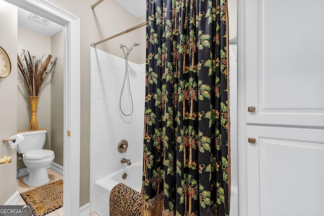 bathroom featuring tile patterned flooring, toilet, visible vents, baseboards, and shower / bathtub combination with curtain