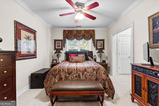 bedroom with ornamental molding, carpet, visible vents, and baseboards