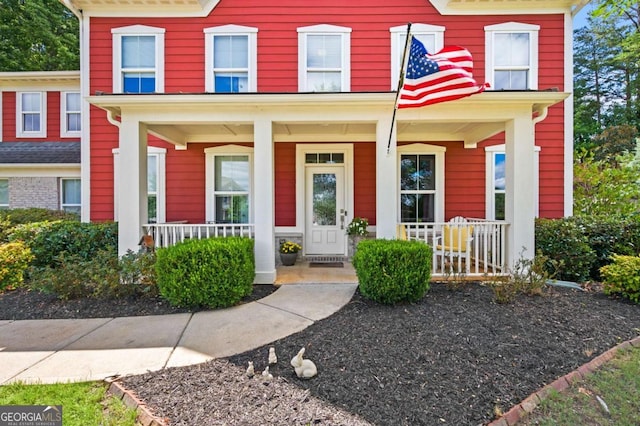 view of front of property featuring covered porch