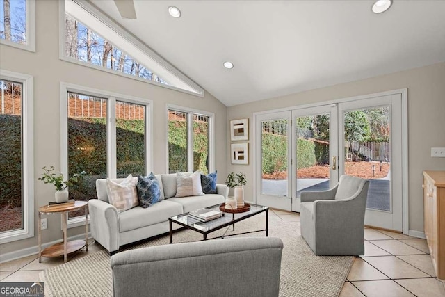 sunroom with plenty of natural light and vaulted ceiling