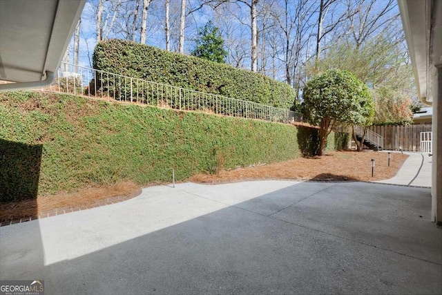 view of yard with a patio and a fenced backyard