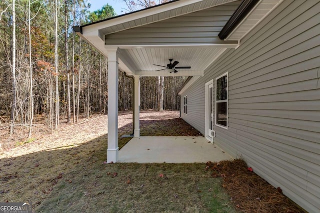 exterior space featuring ceiling fan and a patio