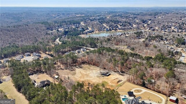 3630 Jim Moore Rd, Dacula, GA 30019 - drone / aerial view featuring a water view and a wooded view