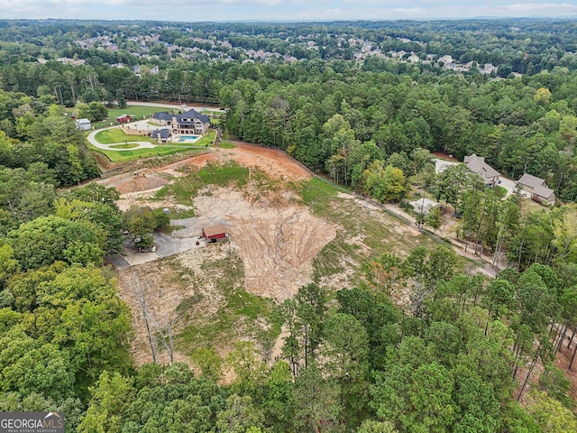 drone / aerial view with a forest view