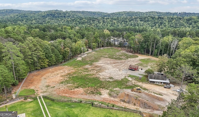 aerial view featuring a view of trees