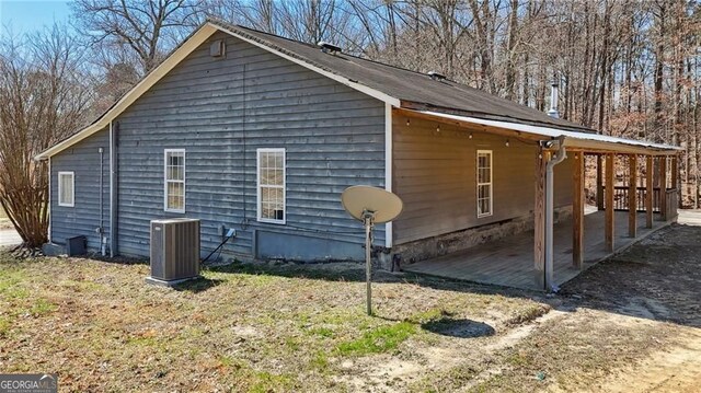 3630 Jim Moore Rd, Dacula, GA 30019 - spare room featuring lofted ceiling, baseboards, a ceiling fan, and concrete flooring