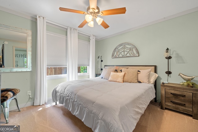 127 Sportsman Cir NE, Milledgeville, GA 31061 - carpeted bedroom featuring a ceiling fan and crown molding