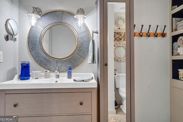 127 Sportsman Cir NE, Milledgeville, GA 31061 - bathroom featuring vanity and toilet