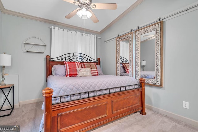 bedroom featuring crown molding, light colored carpet, a barn door, and baseboards