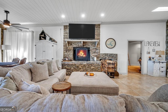 127 Sportsman Cir NE, Milledgeville, GA 31061 - living area featuring ornamental molding, light tile patterned floors, ceiling fan, a fireplace, and wood ceiling