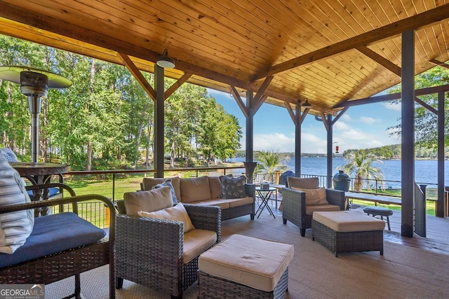view of patio featuring an outdoor hangout area and a water view