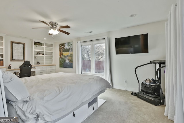 bedroom featuring light carpet, ceiling fan, visible vents, and baseboards