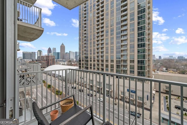 balcony featuring a view of city