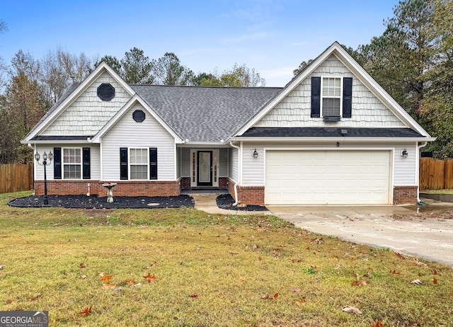 view of front of home with concrete driveway, brick siding, and fence