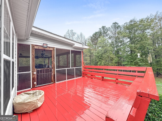 deck with a sunroom