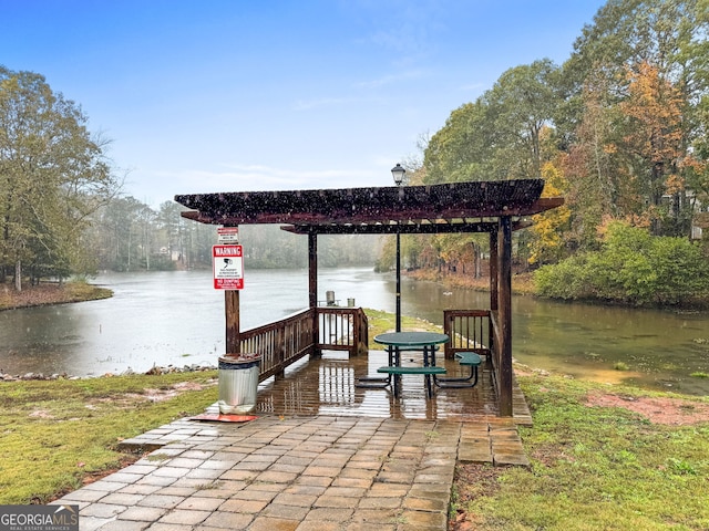 exterior space with a water view