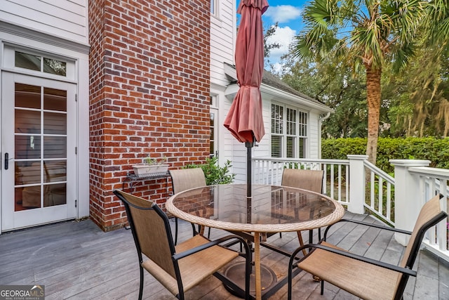 deck featuring outdoor dining space