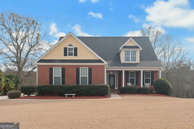 view of front facade featuring brick siding