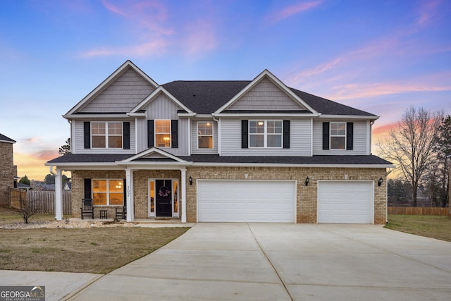 view of front of property featuring an attached garage, covered porch, brick siding, fence, and concrete driveway