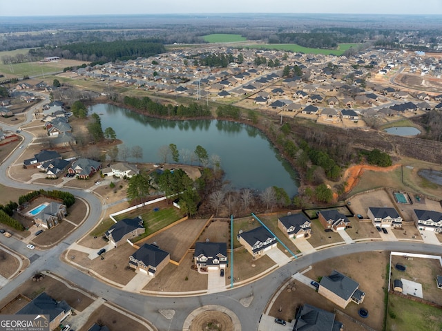 aerial view featuring a water view and a residential view