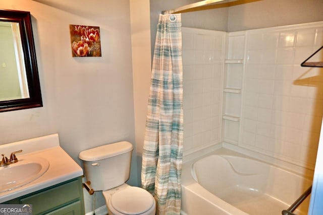 bathroom with toilet, shower / bath combination with curtain, and vanity