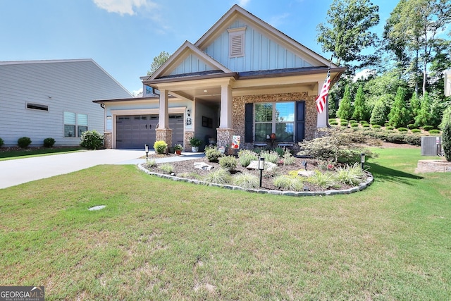 craftsman-style house with brick siding, an attached garage, board and batten siding, driveway, and a front lawn