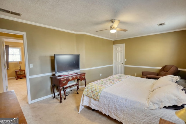 bedroom with crown molding, light colored carpet, visible vents, a textured ceiling, and baseboards