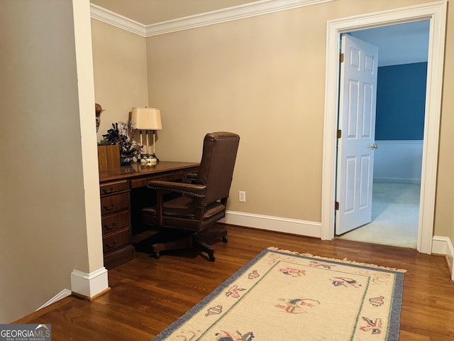 home office with baseboards, ornamental molding, and wood finished floors