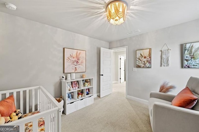 bedroom featuring carpet, visible vents, and baseboards