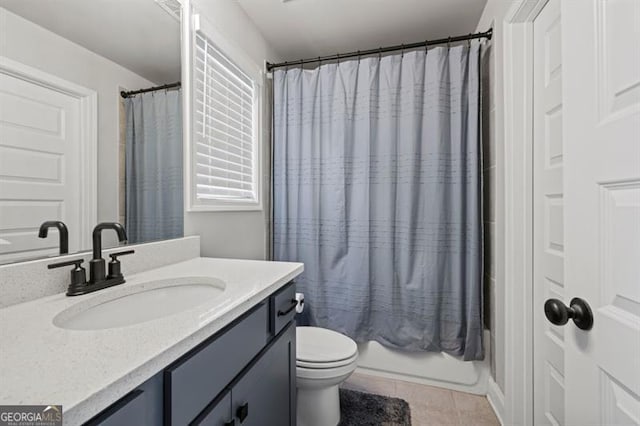 full bathroom with tile patterned flooring, vanity, toilet, and shower / bath combo