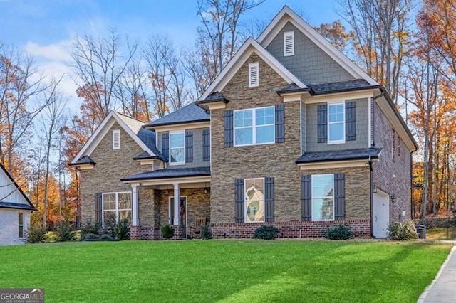 craftsman house with a front lawn