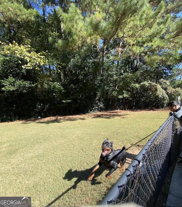 view of yard featuring fence